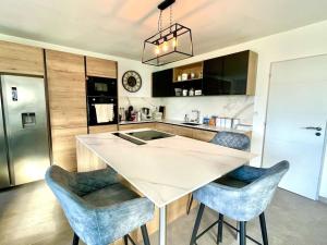 Maisons de vacances Terre Marine - Maison neuve : photos des chambres