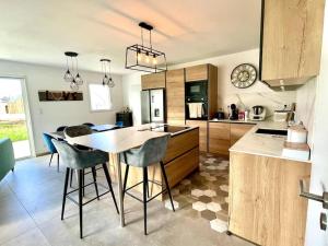 Maisons de vacances Terre Marine - Maison neuve : photos des chambres