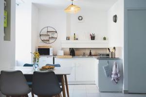 Appartements Grand Studio l-Hermitage : photos des chambres