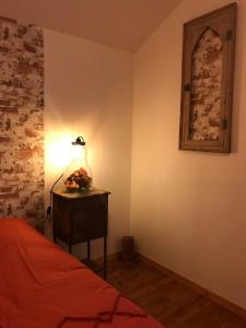 Sejours chez l'habitant La chambre aux briques oranges : photos des chambres