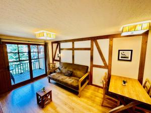 Appartements avec PISCINE INTERIEURE SAUNA Parking Etage 1 au Centre du Village dans Residence Cami Real : photos des chambres