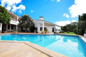 Villas Villa Haut Standing avec Piscine, Vue sur Golf : photos des chambres