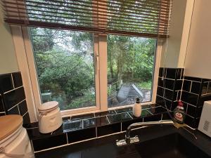 Cosy and secluded brook-side lodge