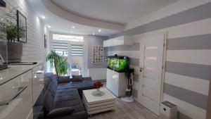 Apartament Rodzinny z ogródkiem w centrum Giżycka