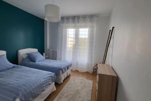 Appartements Appartement spacieux et moderne : photos des chambres