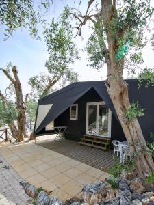 Deluxe Bungalow with Garden View room in Camping Valle d'oro