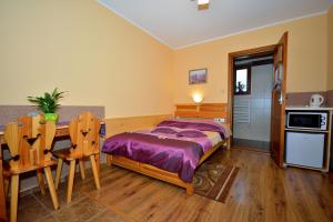 Sykowny Domek - Pokoje Gościnne