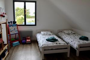 Maisons de vacances Villa near beach with pool 11 pers baby : photos des chambres