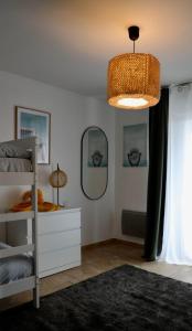 Appartements A 100 m2 appartement with terrasse near the beach : photos des chambres
