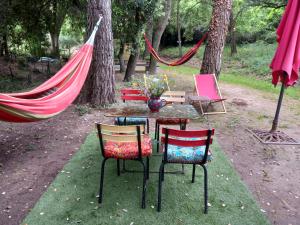 Tentes de luxe La roulotte du petit paradis : photos des chambres