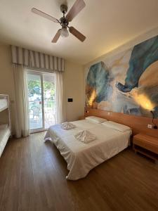 Quadruple Room with Balcony room in La Maison Hotel