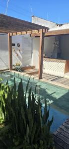 Casa Beija Flor - 03 quartos com suíte, piscina e área de churrasco, luxo totalmente privativa