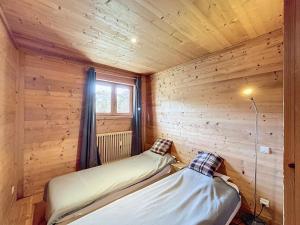 Appartements Appartement 4 pieces avec piscine couverte a Combloux - FR-1-560-127 : photos des chambres