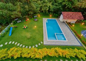 Glen Castle Vagamon Pool Resort by VOYE HOMES