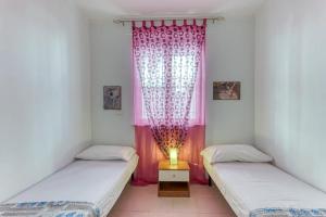 Appartamento climatizzato con patio esterno privato a 150 m dal mare