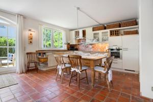 5 Sterne Reetdachhaus Wildröschen