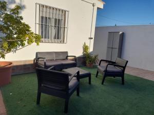 Apartamento con barbacoa y porche