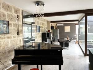 Villas Maison exceptionnelle esprit loft avec piscine : photos des chambres