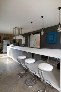 Villas Maison exceptionnelle esprit loft avec piscine : photos des chambres