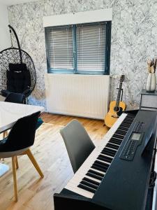 Villas Charmante maison au Nord de Paris piscine chauffee : photos des chambres