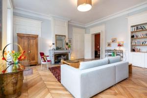 Appartements L-Authentique - Appartement en coeur de ville : photos des chambres