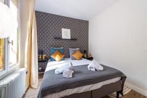 Appartements Maison atypique et familiale, proche Disney avec Wifi : photos des chambres
