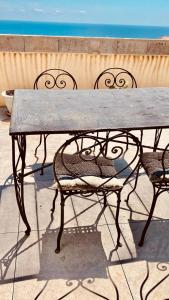 Appartements RooftopTerrace apartment in village center : photos des chambres