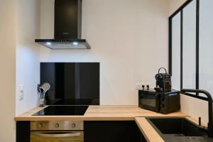 Appartements Le Chanzy - Les Demeures d-Adrien : photos des chambres