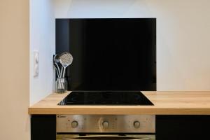 Appartements Le Chanzy - Les Demeures d-Adrien : photos des chambres