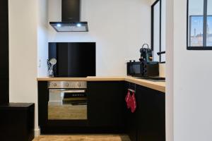 Appartements Le Chanzy - Les Demeures d-Adrien : photos des chambres