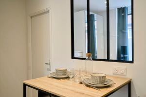 Appartements Le Chanzy - Les Demeures d-Adrien : photos des chambres
