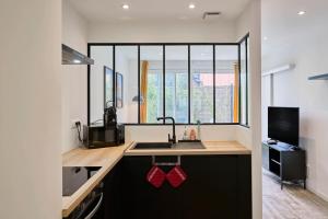 Appartements Le Chanzy - Les Demeures d-Adrien : photos des chambres