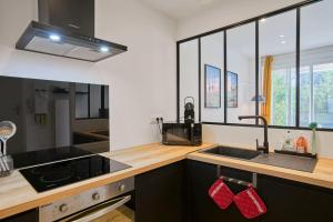 Appartements Le Chanzy - Les Demeures d-Adrien : photos des chambres