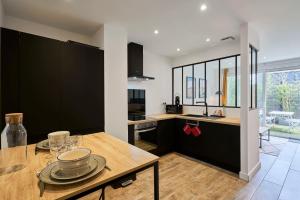 Appartements Le Chanzy - Les Demeures d-Adrien : photos des chambres