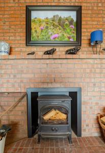 The Schoolhouse Cottages peaceful and quiet retreat with log burner