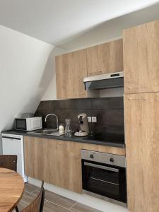 Appartements Cocoon Clair de Lune sous les combles PARKING GRATUIT : photos des chambres