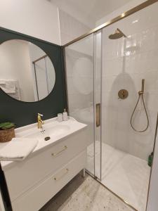 Appartements L'Oiseau vert - calme, ressourcant et proche du centre ville : photos des chambres