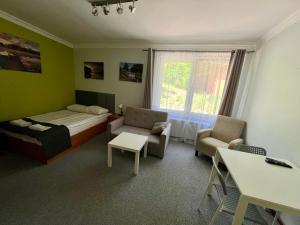 Triple Room with Garden View room in Gościniec Rospuda