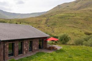 Heather Lodge with Sea and Mountain Views