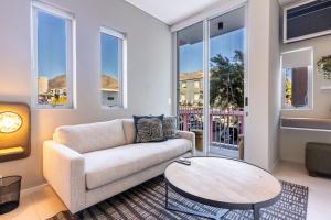 The Rose 107: Modern Corner Unit with Balcony ~