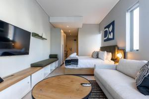 The Rose 107: Modern Corner Unit with Balcony ~