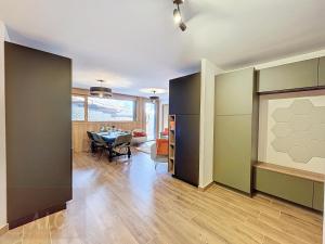 Appartement dException 2 Chambres, 63 m², au Pied des Pistes, Parking Inclus, Wi-Fi - FR-1-560-142