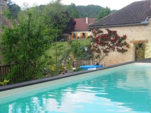 Maisons de vacances Gite Atelier Montignac // Piscine a debordement : photos des chambres