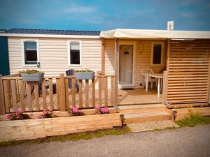 Campings Mobilhome P27 6 personnes climatise : photos des chambres