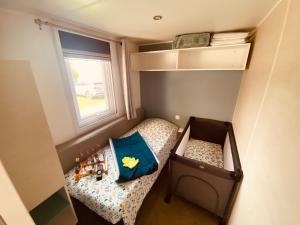 Campings Mobilhome P27 6 personnes climatise : photos des chambres
