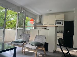 Appartements Oasis de Verdure avec Balcons - Proche Versailles : photos des chambres