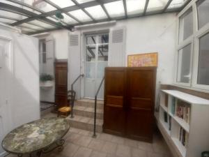 Maisons de vacances La maison du jardin : Maison de Ville 3 Chambres