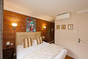 Hotels Hotel Les Pasteliers : photos des chambres