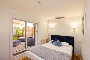 Hotels Hotel Les Pasteliers : photos des chambres