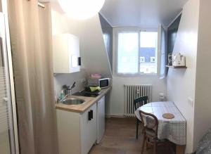 Appartements Studio BATIK : photos des chambres